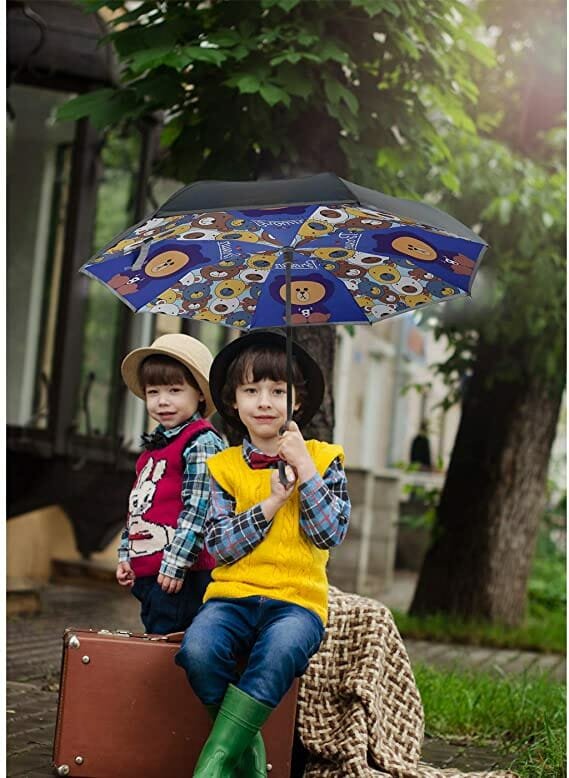 Children holding Reverse kids umbrella teddy bear