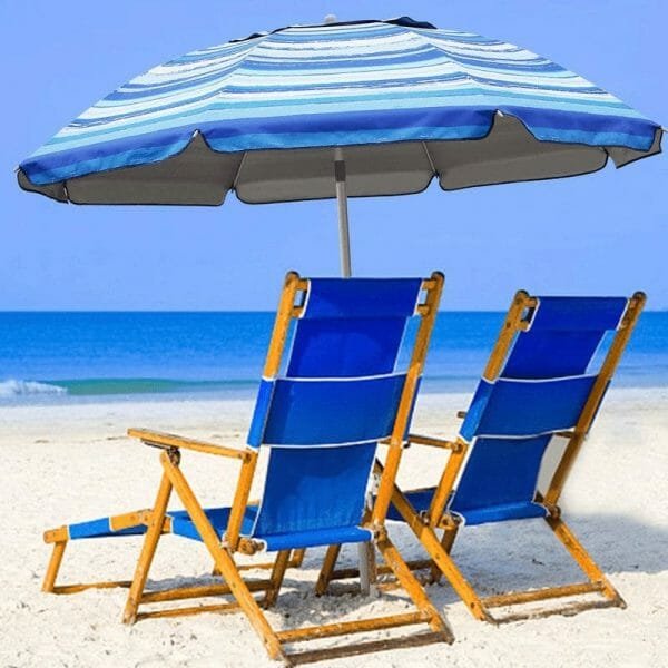 a group of lawn chairs sitting on top of a beach