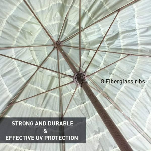 8.5 Ft Thatched Beach Umbrella with strong and durable glass ribs offers effective UV protection.