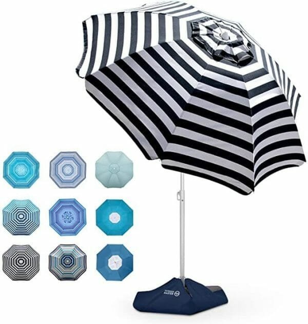 A Double Layer 160g Polyester Beach Umbrella | ARDECO on a stand with different colors.