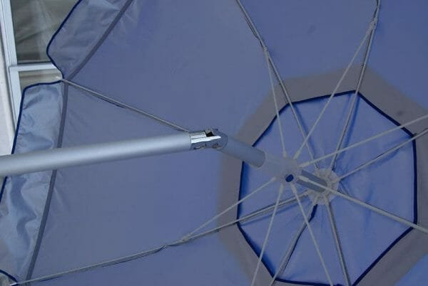 A close up of a Polyester Beach Umbrella (2M Advertising) with a metal pole.