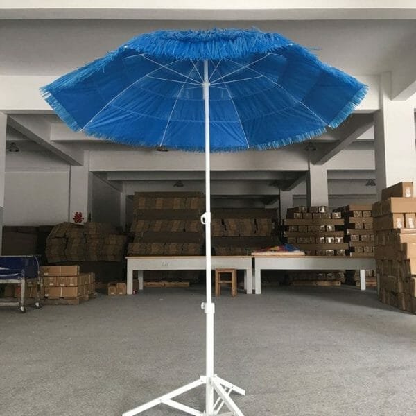 a blue umbrella sitting on top of a building