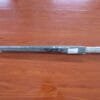 A 27in Aluminum Single Layer Auto Golf Umbrella sitting on a wooden floor.