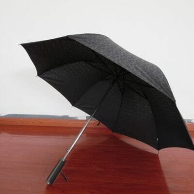 a person with an open umbrella