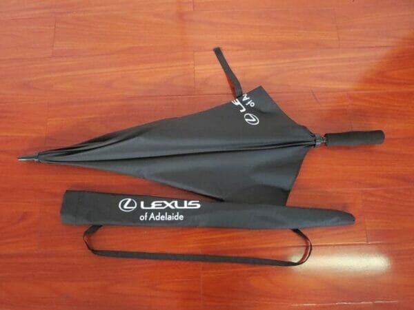 A 30inch Manual Open Golf Umbrella with the word lexus on it.