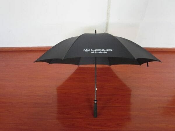 A 30inch Manual Open Golf Umbrella with the word lexus on it.