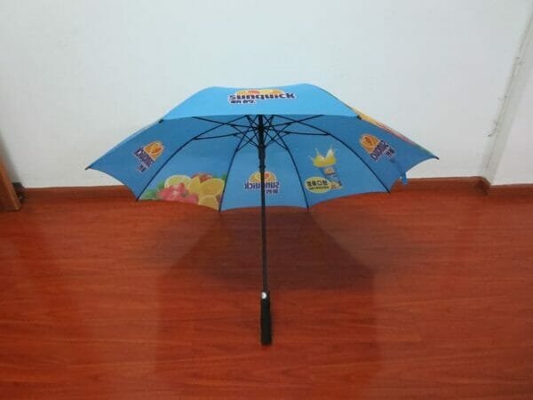 A 30in Single Layer Auto Golf Umbrella with a picture of a fruit on it.