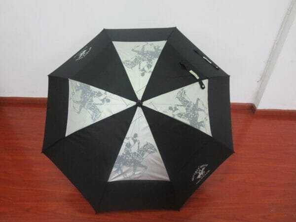 A 30inch Double Layer Golf Umbrella with a design on it.