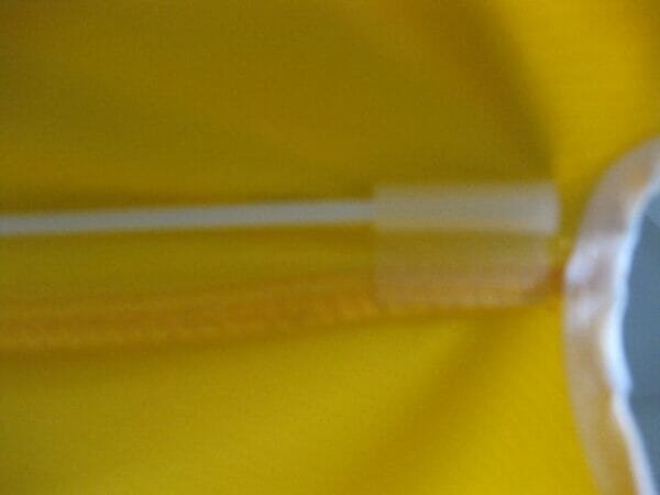 A close up of a 1.6m PVC Beach Umbrella with a zipper.