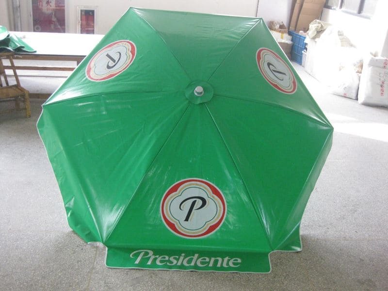A 1.6m PVC Beach Umbrella with a logo on it.