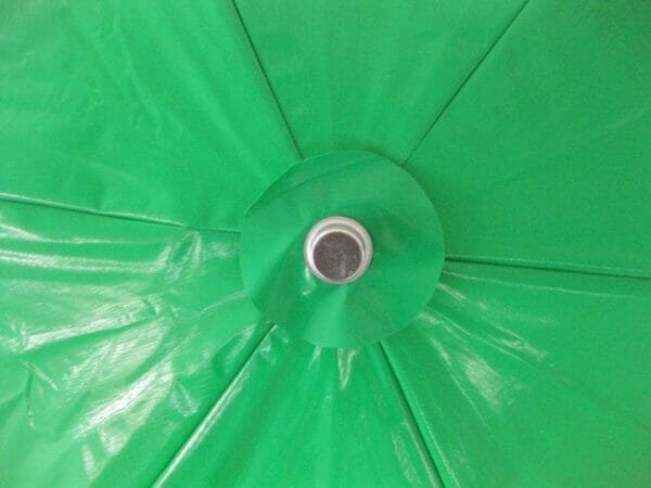 A 1.6m PVC Beach Umbrella with a hole in the middle.