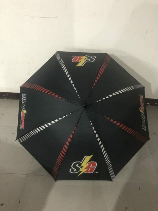 A black and red 32in Single Layer Auto Golf Umbrella with a logo on it.