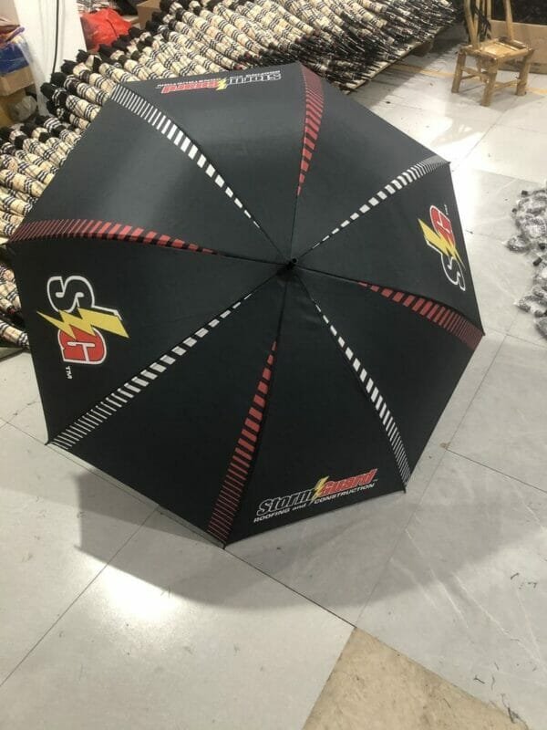 A 32in Single Layer Auto Golf Umbrella with a logo on it.