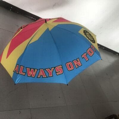 A colorful 30in Single Layer Auto Golf Umbrella 190T with the words always on tour on it.