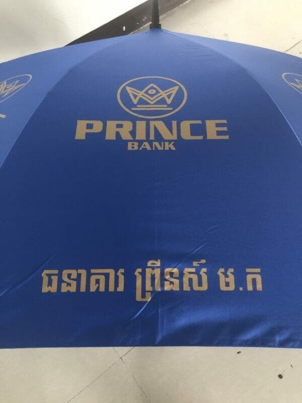 A 30in Black Single Layer Auto Golf Umbrella with the word prince on it.