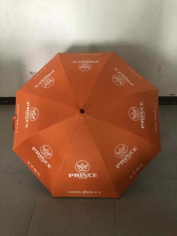 A 30in Black Single Layer Auto Golf Umbrella with white text on it.