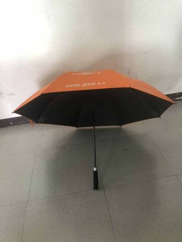 An orange and 30in Black Single Layer Auto Golf umbrella.