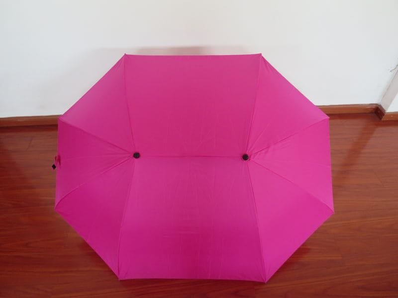 a large pink umbrella
