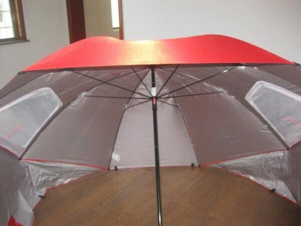 an umbrella sitting on top of a table