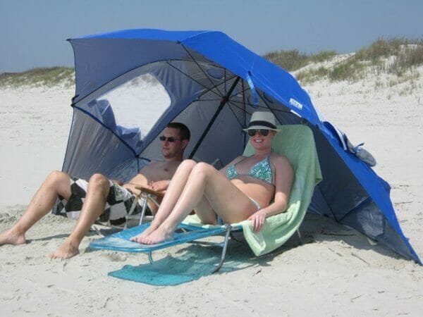 a person lying on a beach