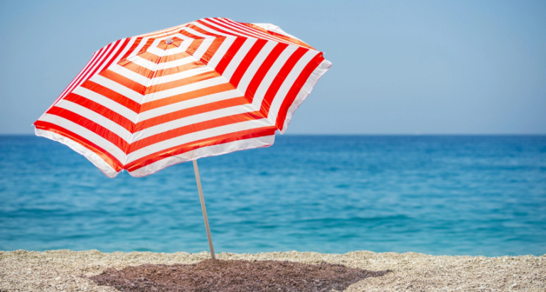 a flag on a sandy beach